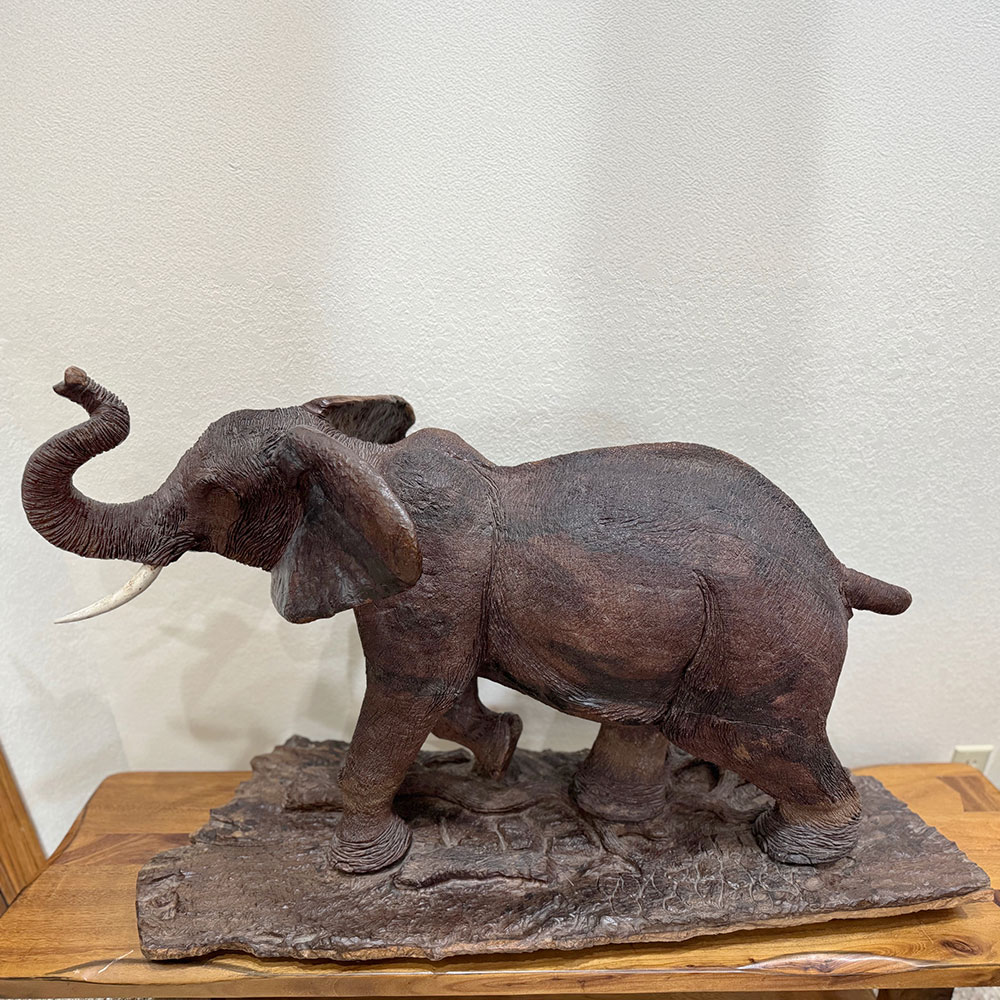 large wood elephant sculpture