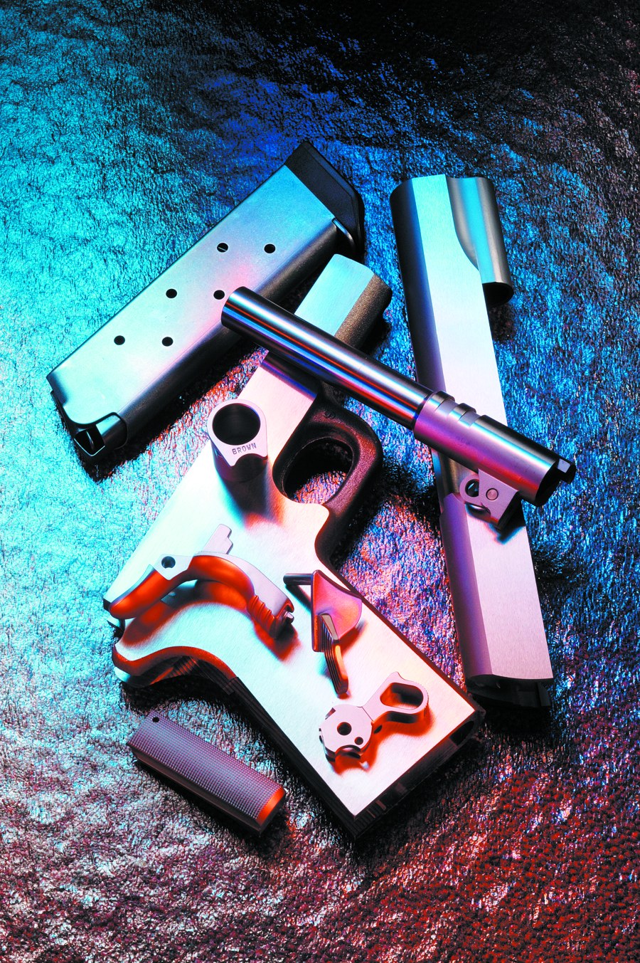 Ed Brown 1911 components representing decades of 1911 design and manufacturing